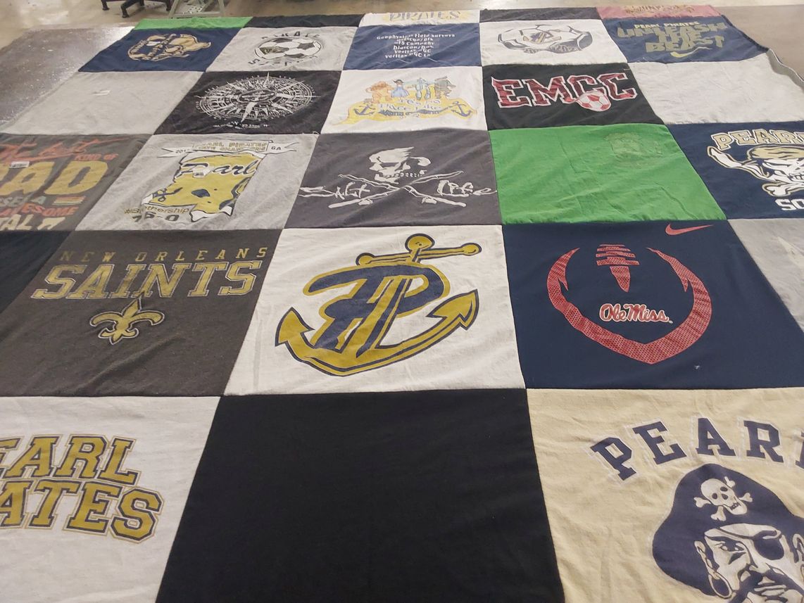 T-shirt quilt featuring new orleans saints, ole miss rebels by Debra from MS