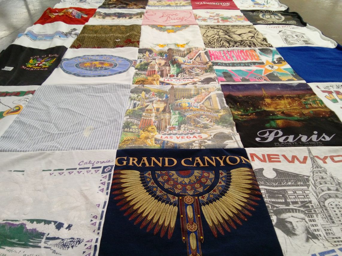 T-shirt quilt with travel, tourism themes by Laura from SC