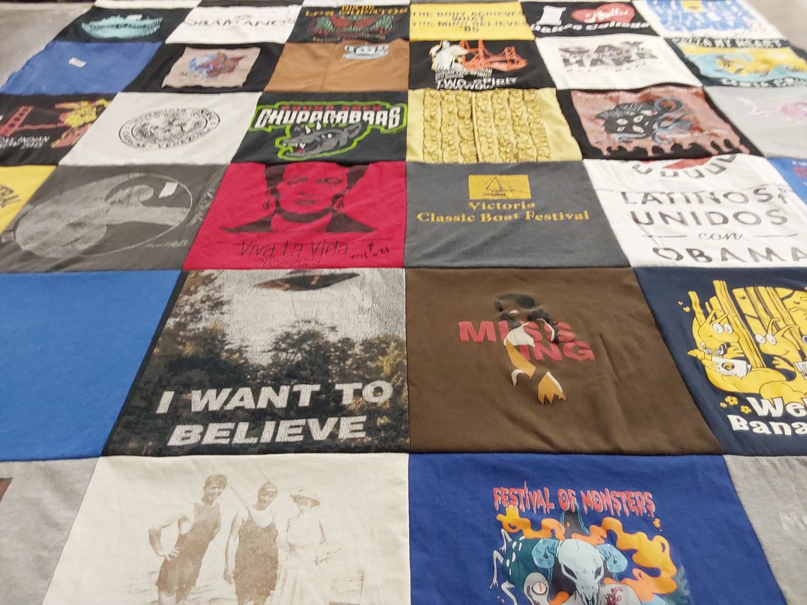 T-shirt quilt with festivals, community themes by MONICA from CA