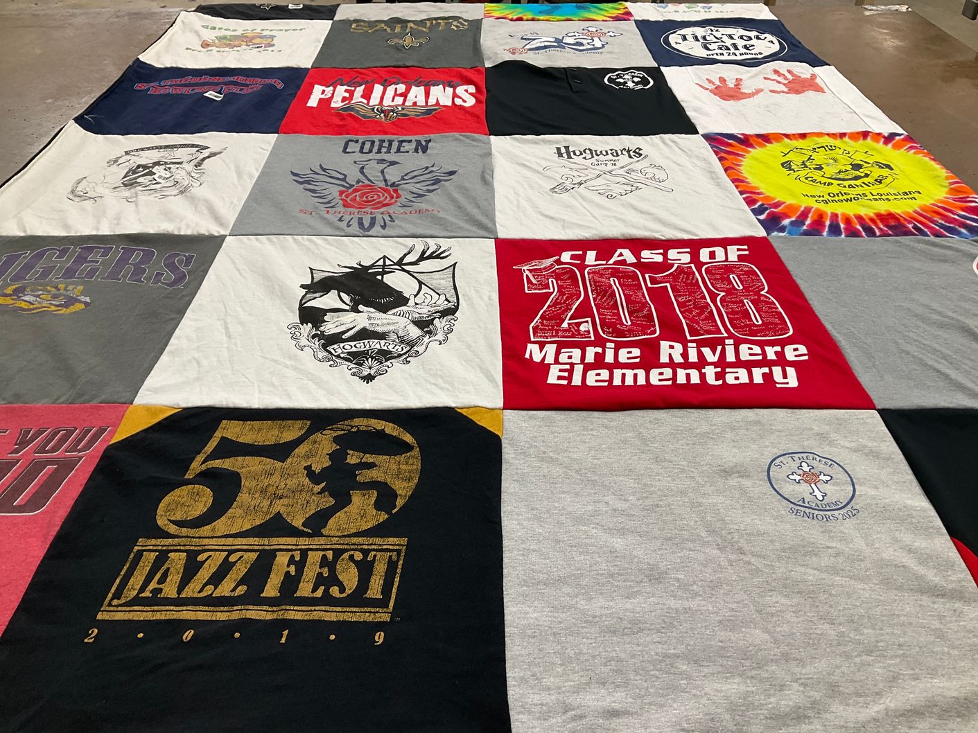 T-shirt quilt from st. thérèse academy, marie riviere elementary by Natalie Barrocas from LA