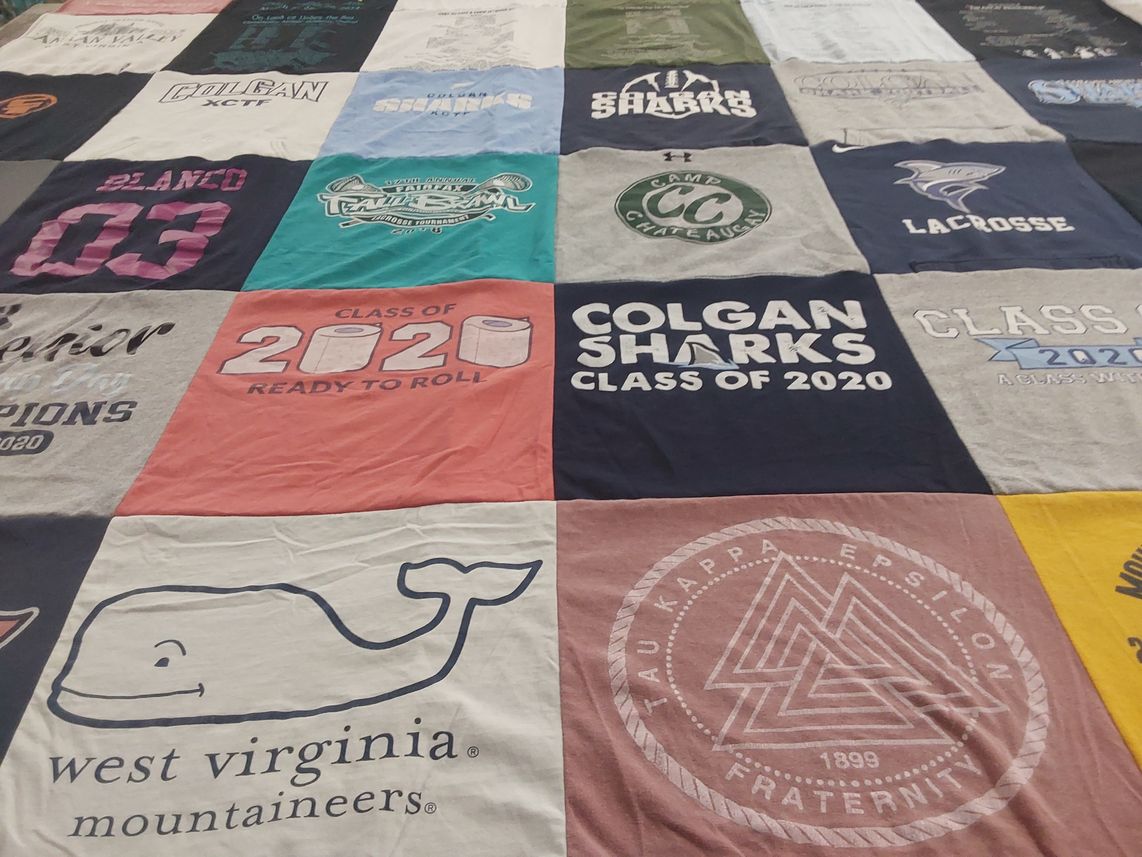 T-shirt quilt featuring colgan sharks by Kathleen from VA