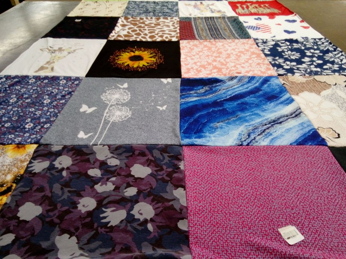 T-shirt quilt with quilting, sewing themes by Michelle from WA