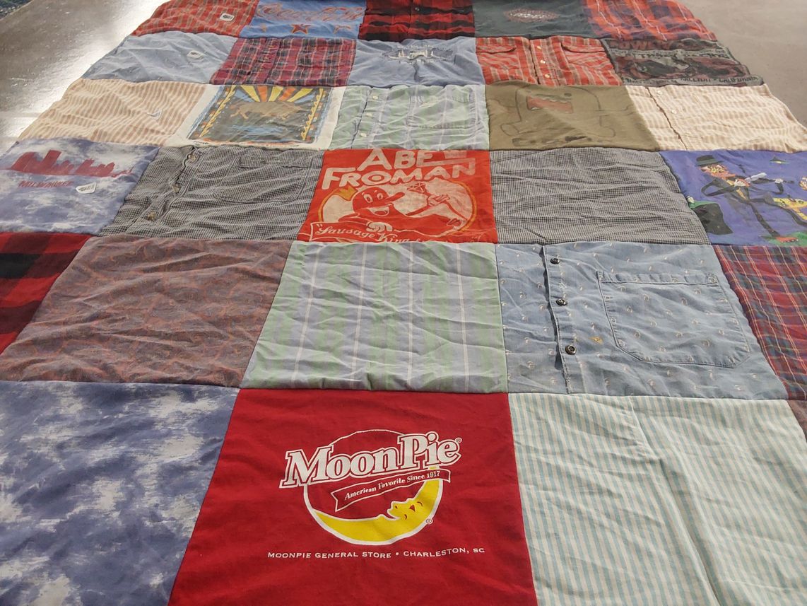 T-shirt quilt with quilting themes by Nicole from WI