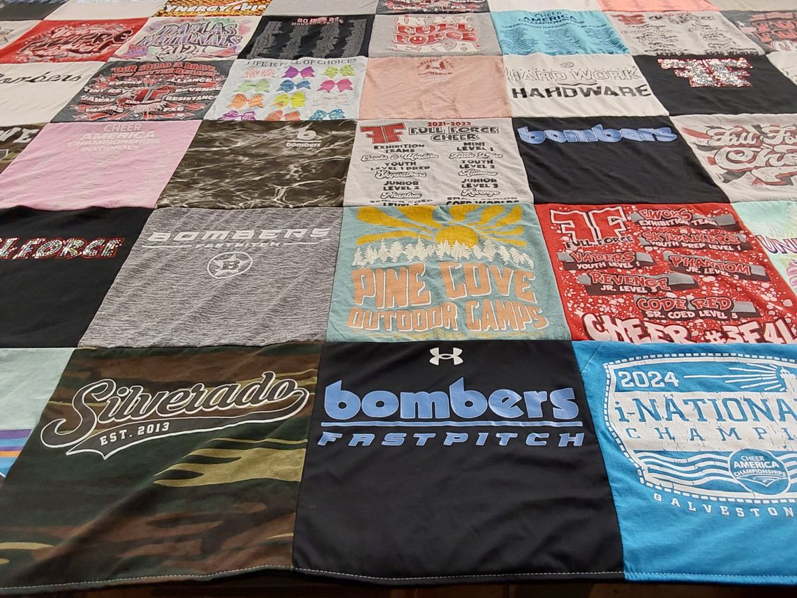 T-shirt quilt featuring bomber fastpitch by Dannielle from TX