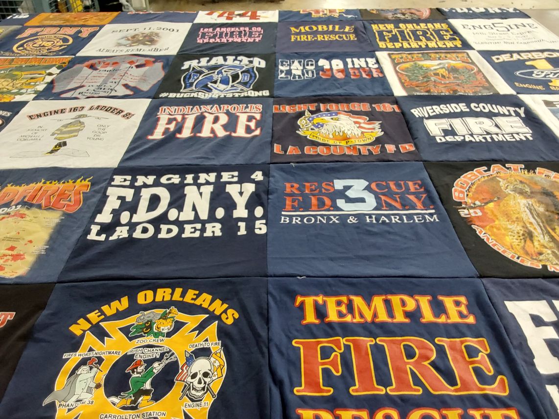 T-shirt quilt with firefighting, rescue services themes by Brandy from CA
