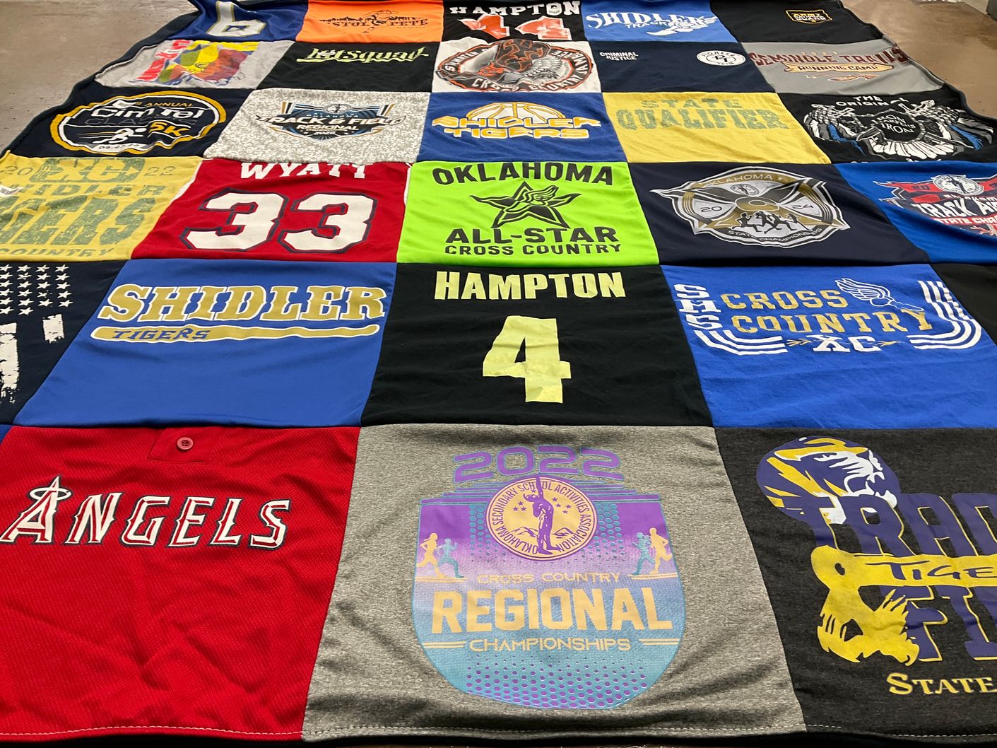 T-shirt quilt featuring oklahoma cross country team, shidler high school cross country team by Claudia from OK