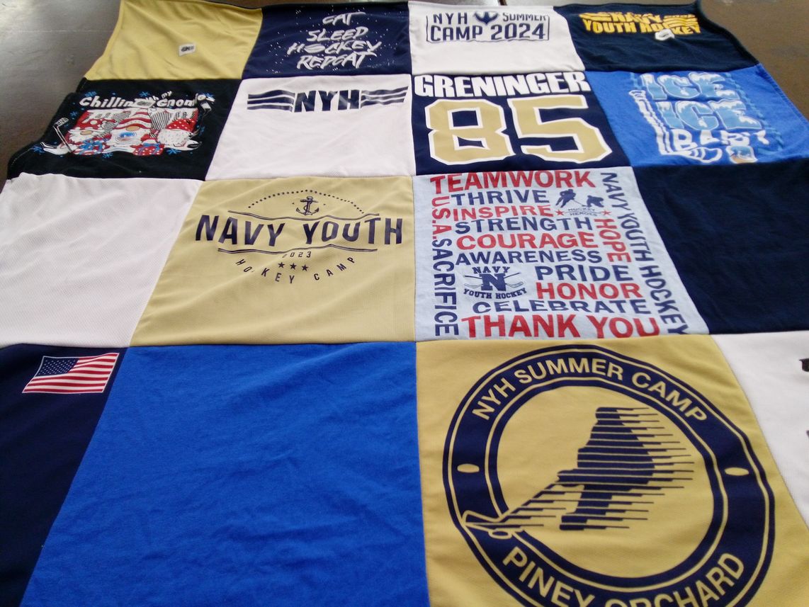 T-shirt quilt with hockey, youth sports themes by Jeffrey from MD