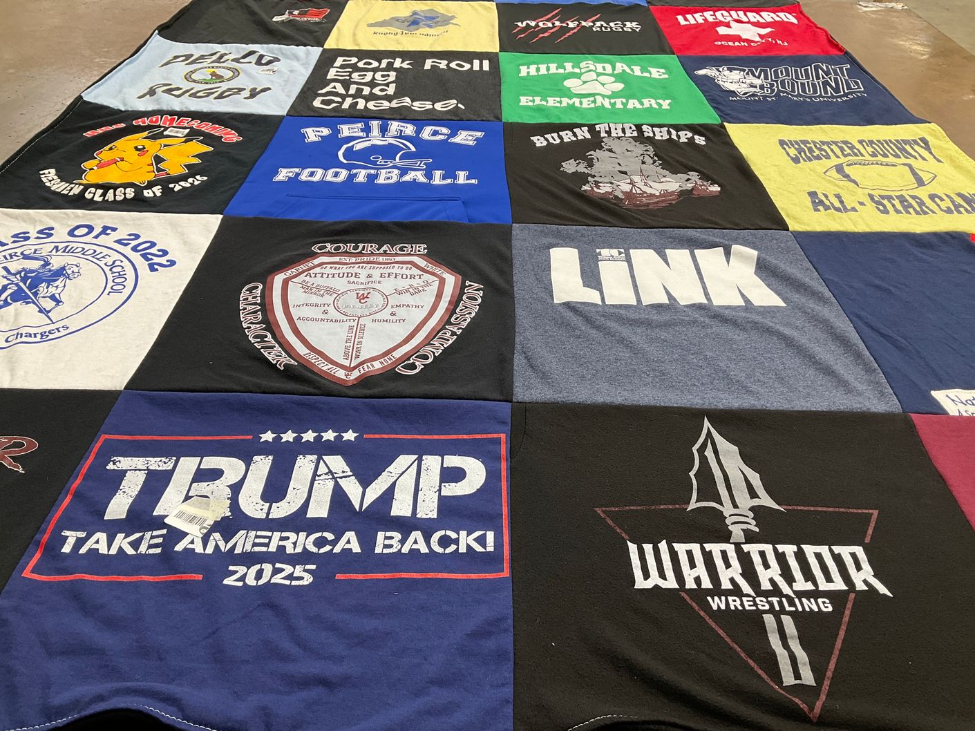T-shirt quilt featuring warrior wrestling by Sandy from PA