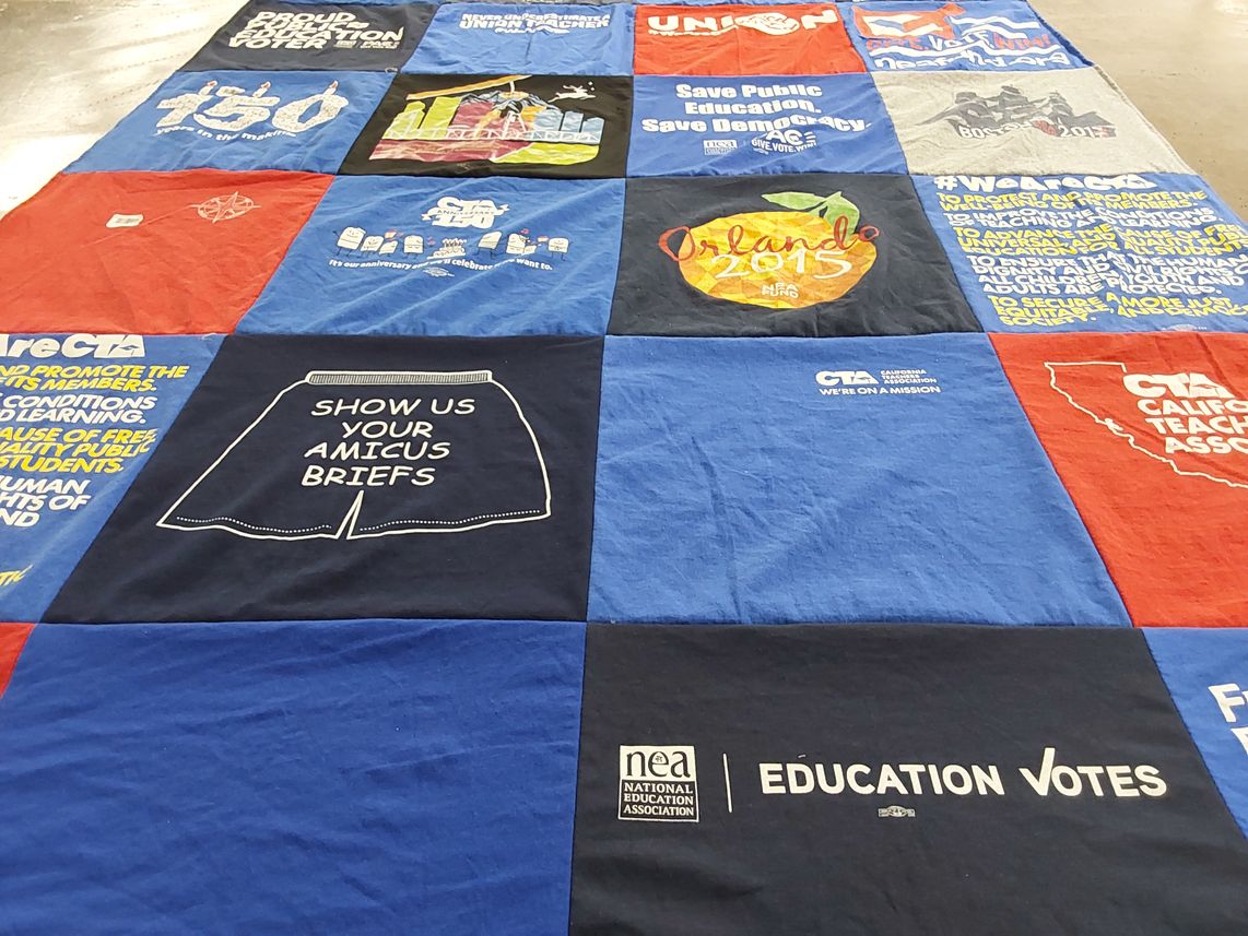 T-shirt quilt with education, democracy themes by Mary Rose from CA