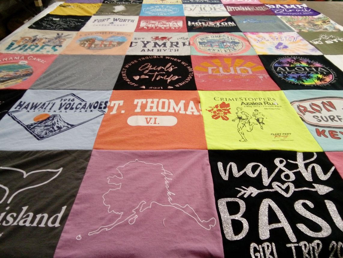 T-shirt quilt with travel, running themes by Lori from NC