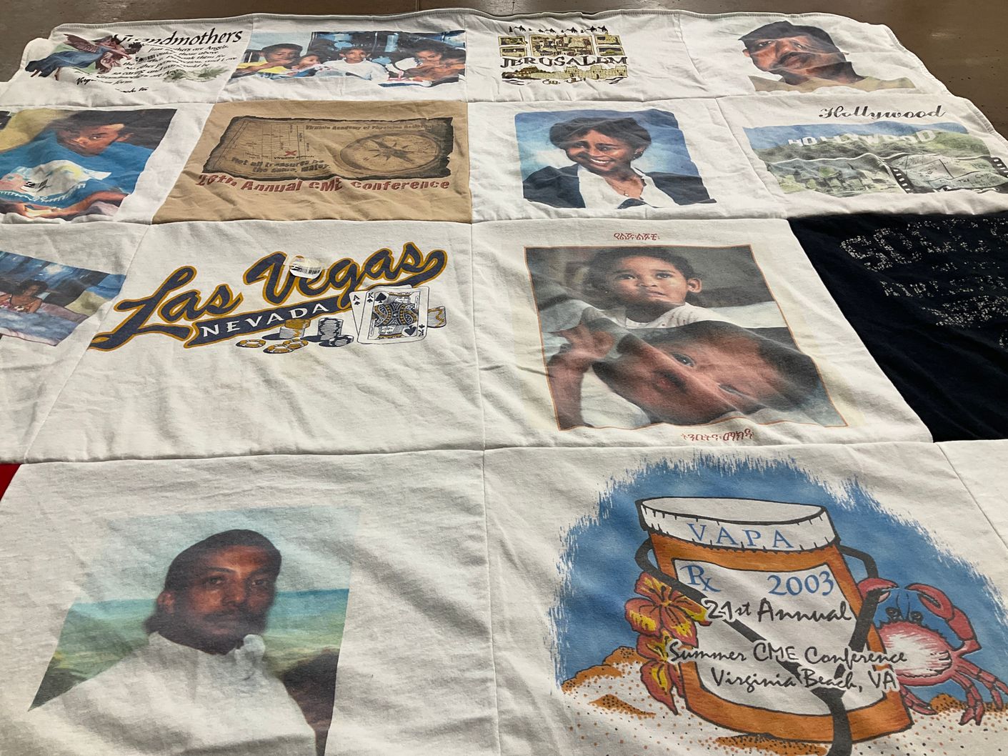 T-shirt quilt with travel, family themes by Selamawit from MD