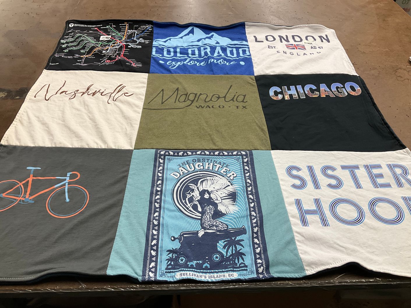 T-shirt quilt with travel, cycling themes by Maria from FL