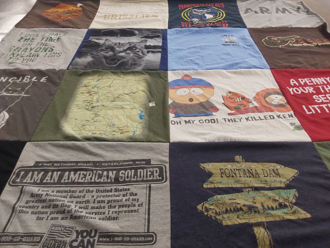 T-shirt quilt with military, comedy themes by Evonne from NC
