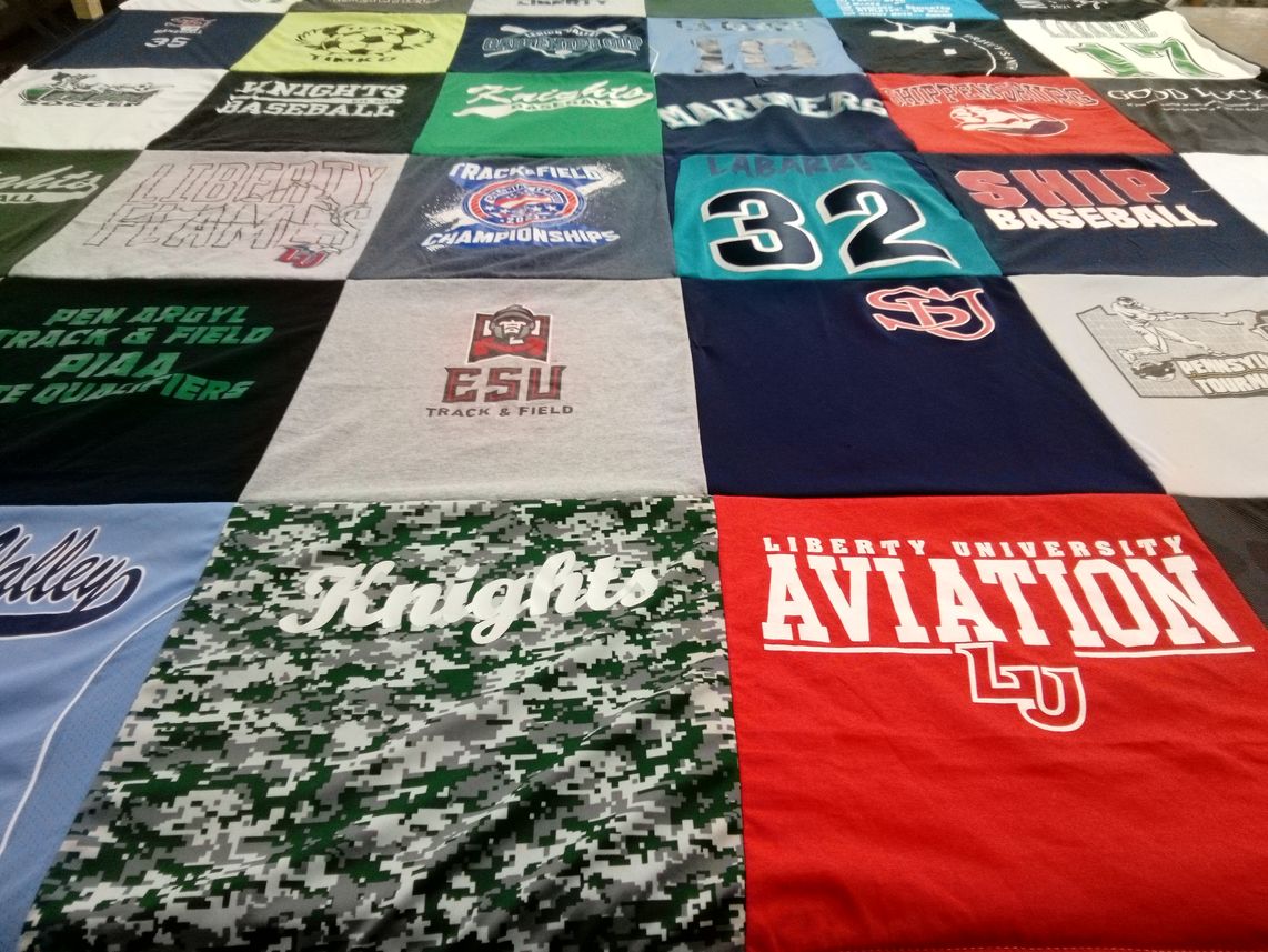 T-shirt quilt featuring ship baseball, penn argyl track & field by Janine from PA