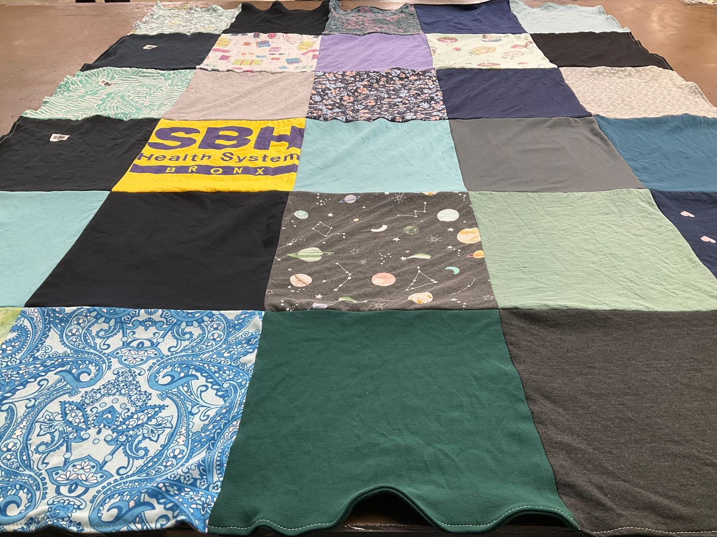 T-shirt quilt with healthcare, space themes by Lauren from NY