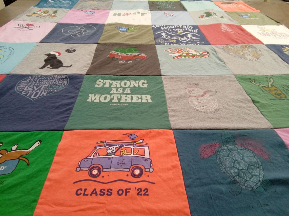 T-shirt quilt with family, nature themes by Laura from MA