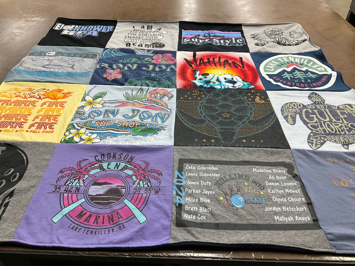 T-shirt quilt with surfing, boating themes by Erin from KS