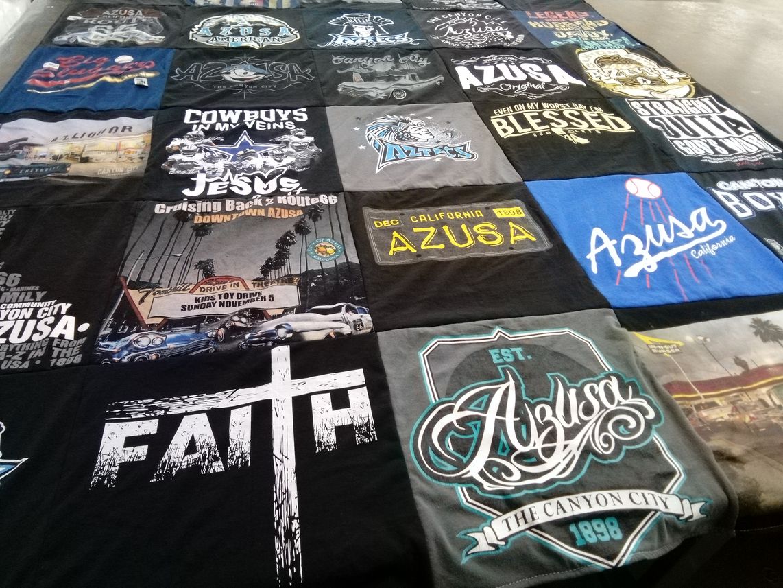 T-shirt quilt with community, faith themes by Sandra from CA