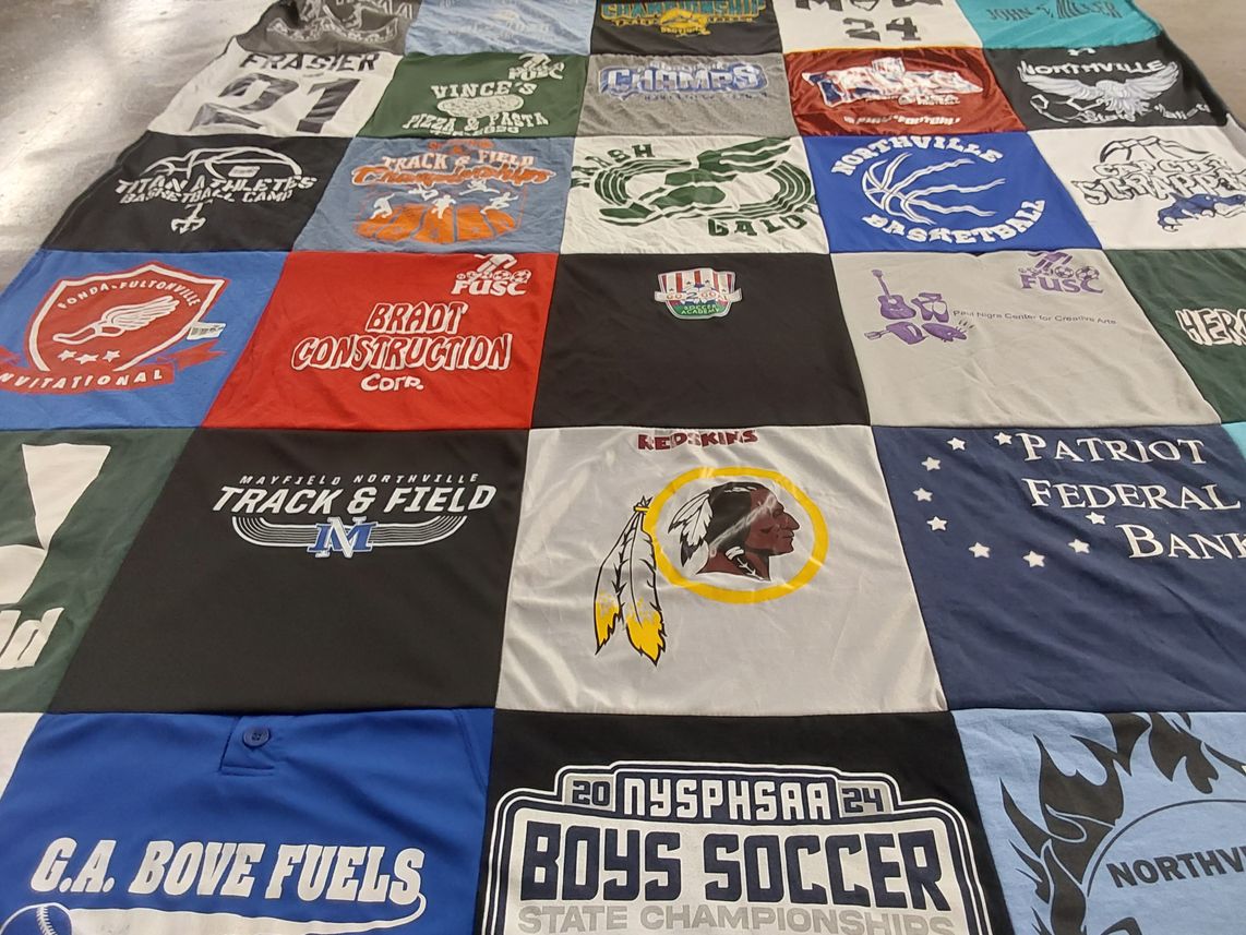 T-shirt quilt featuring mayfield northville track and field team, northville basketball team by Rachel from NY