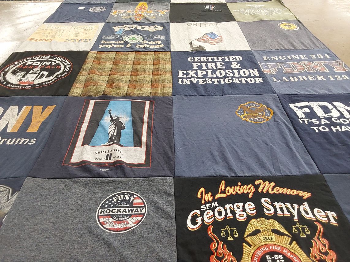 T-shirt quilt with firefighting, emergency services themes by Peter from IA