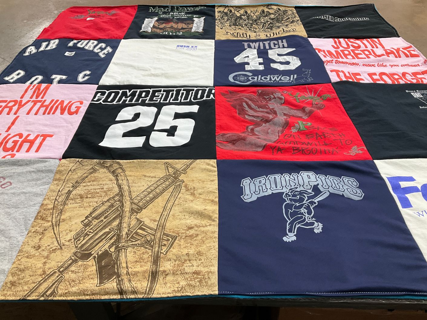 T-shirt quilt featuring iron pigs by Holly from TX