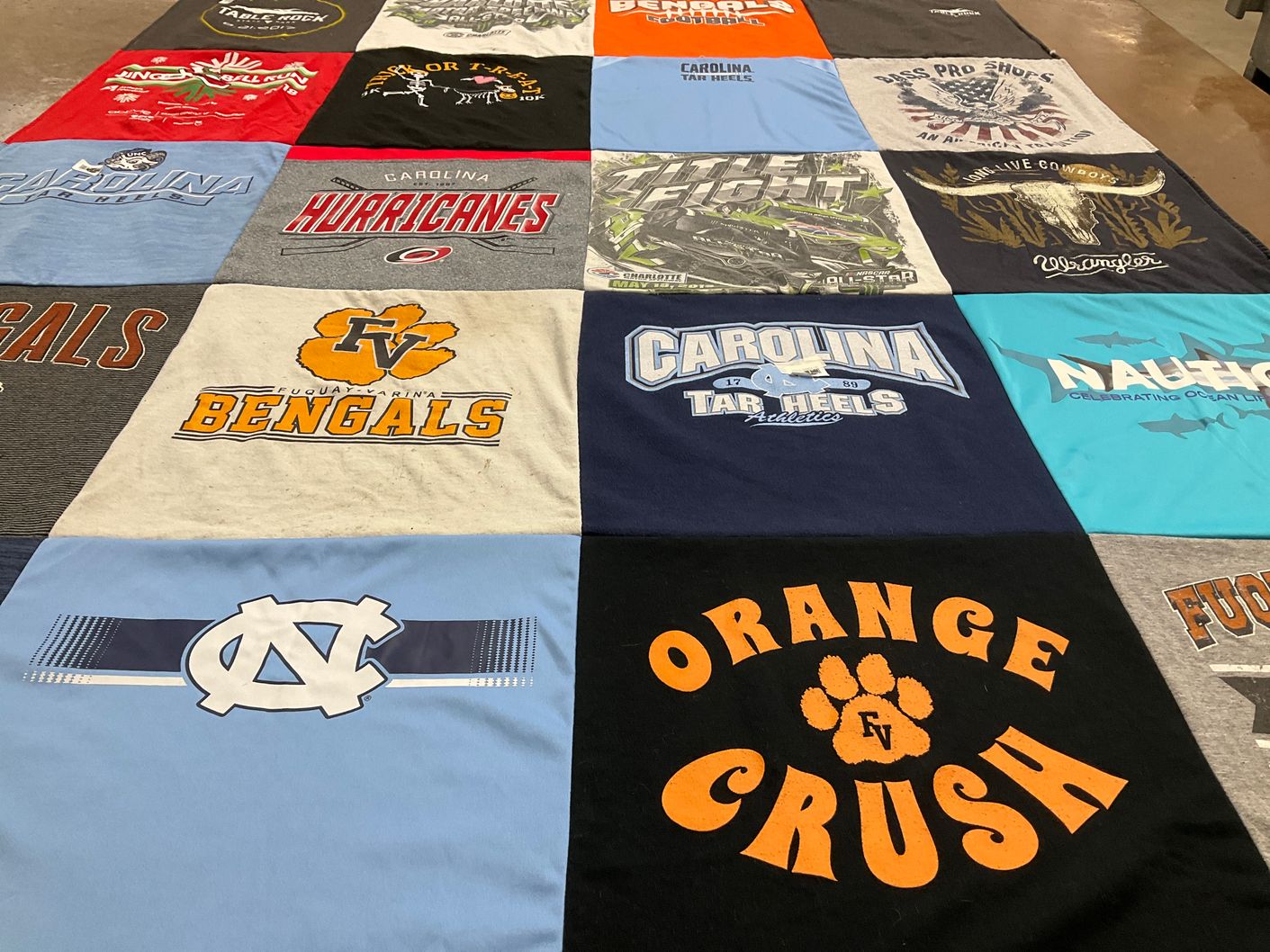 T-shirt quilt featuring fuquay-varina bengals, university of north carolina at chapel hill tar heels by Jocelin from NC