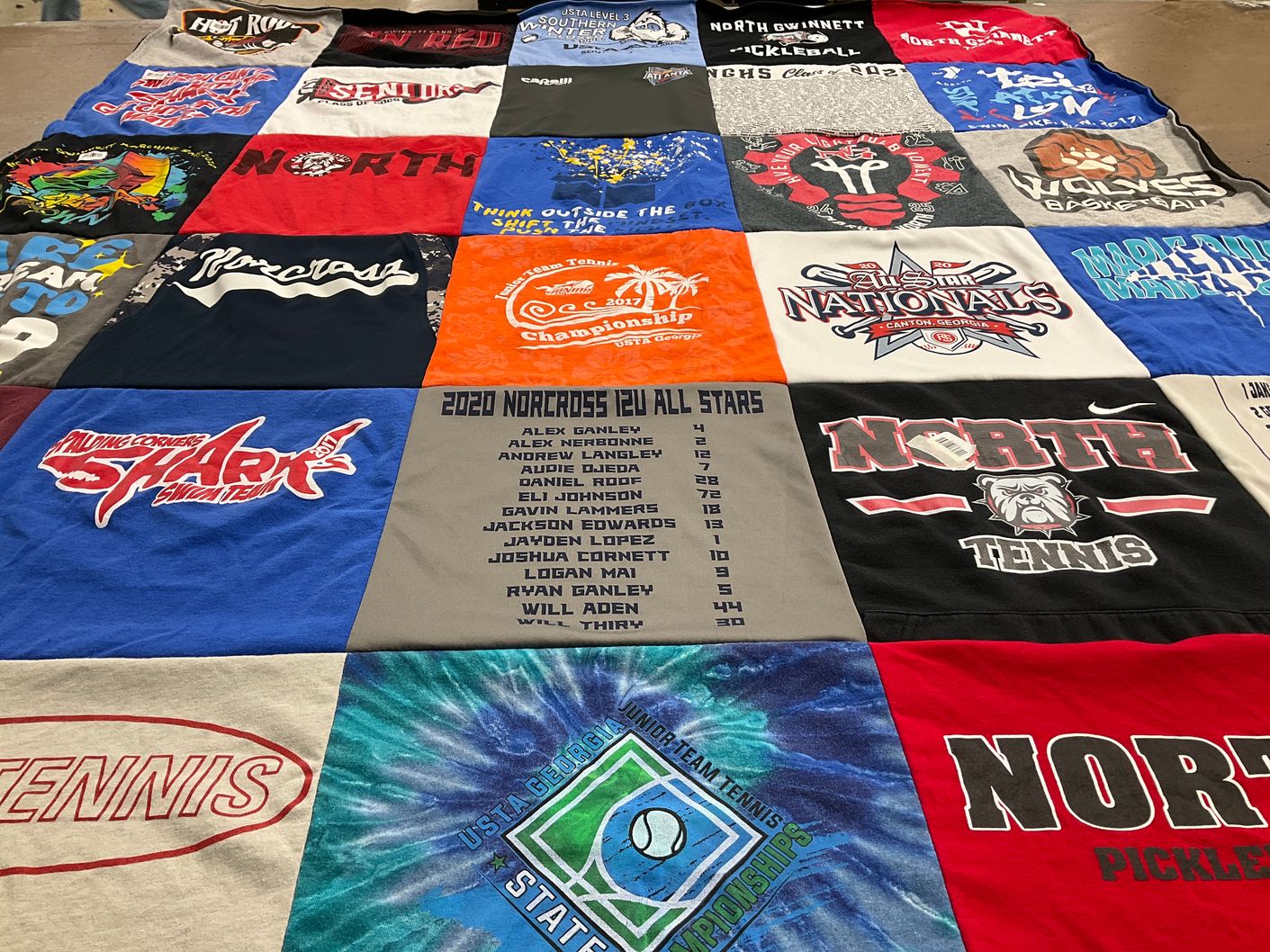 T-shirt quilt from north gwinnett high school by Amy from GA