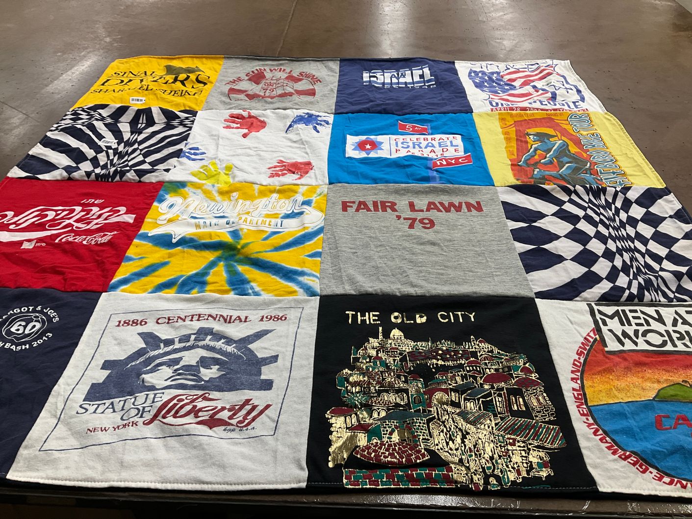 T-shirt quilt with travel, history themes by Susan from CT