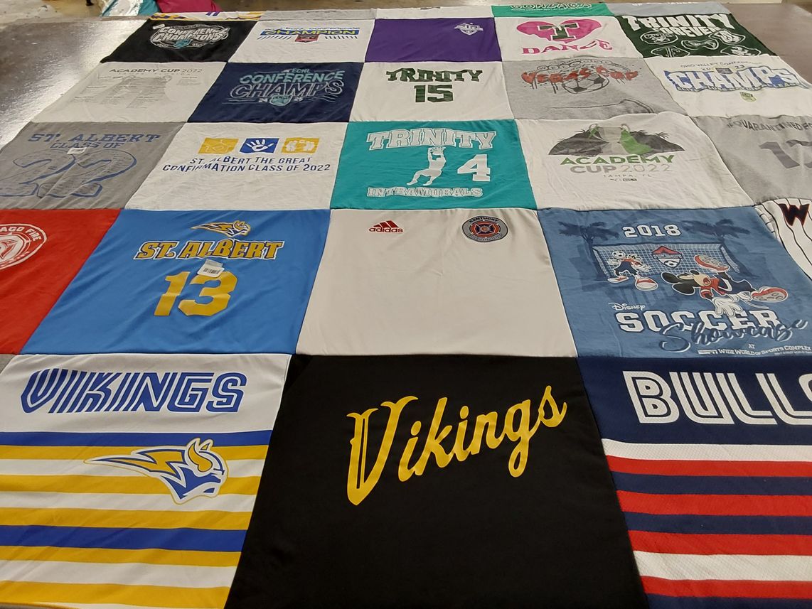 T-shirt quilt featuring trinity college, st albert school by Eryn from KY