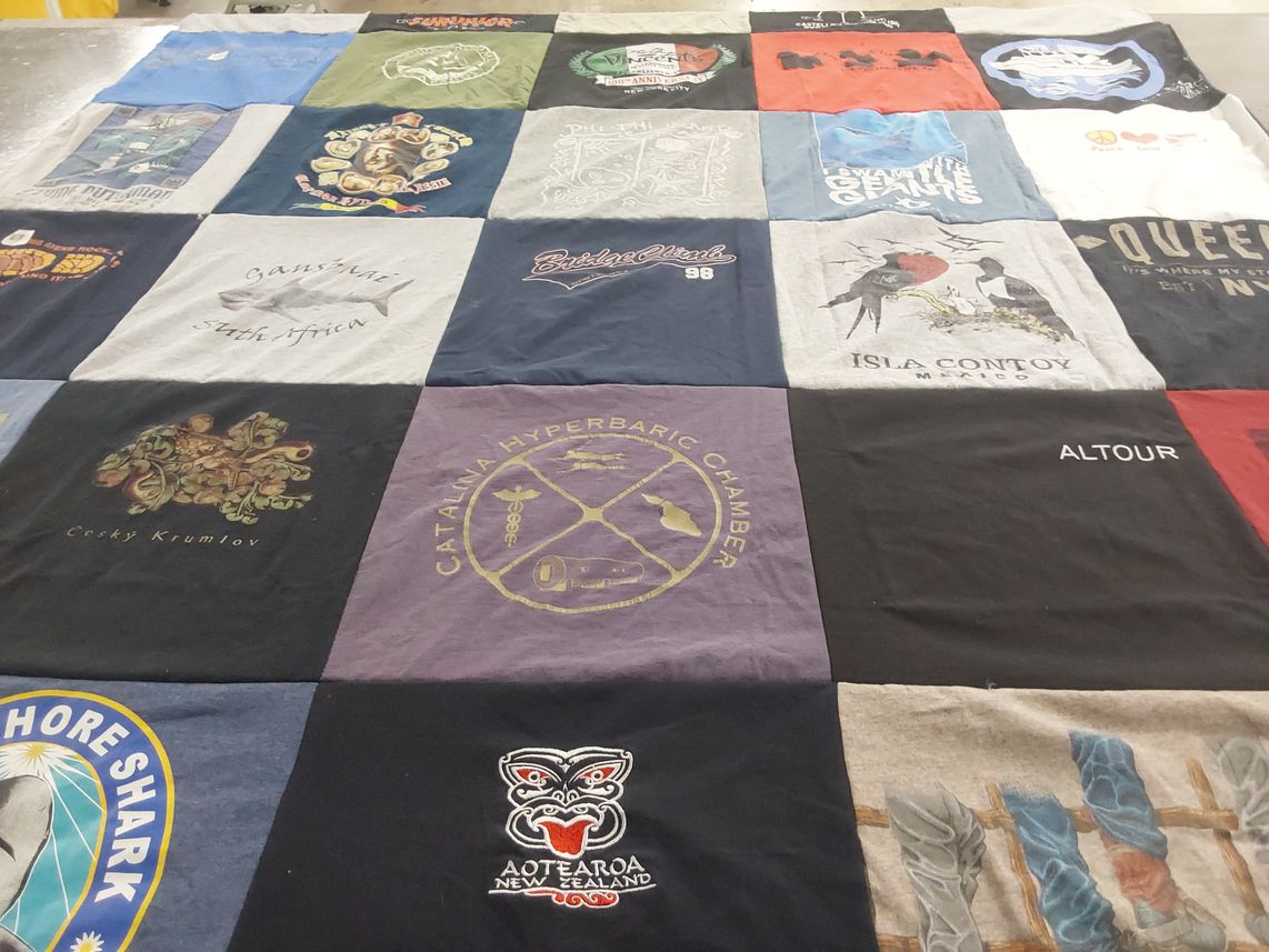 T-shirt quilt with scuba diving, travel themes by Heather from CA