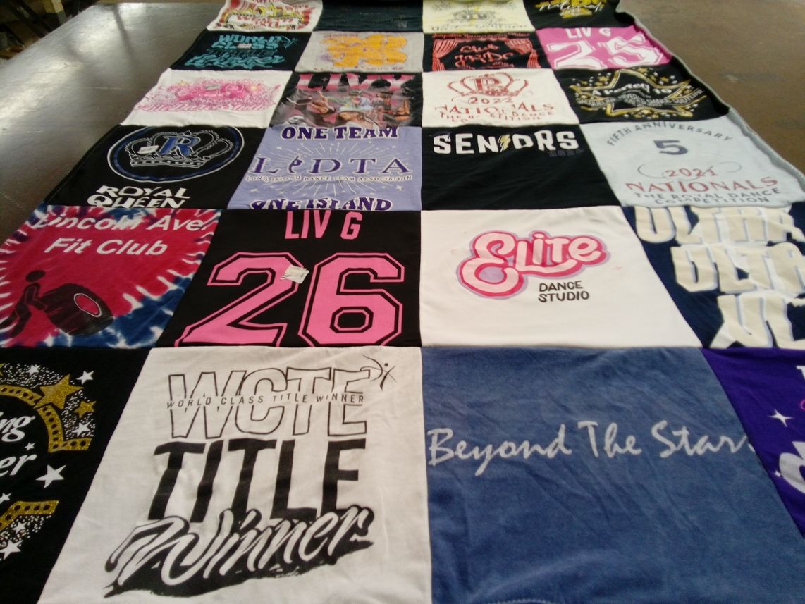 T-shirt quilt with dance, fitness themes by Deborah from NY