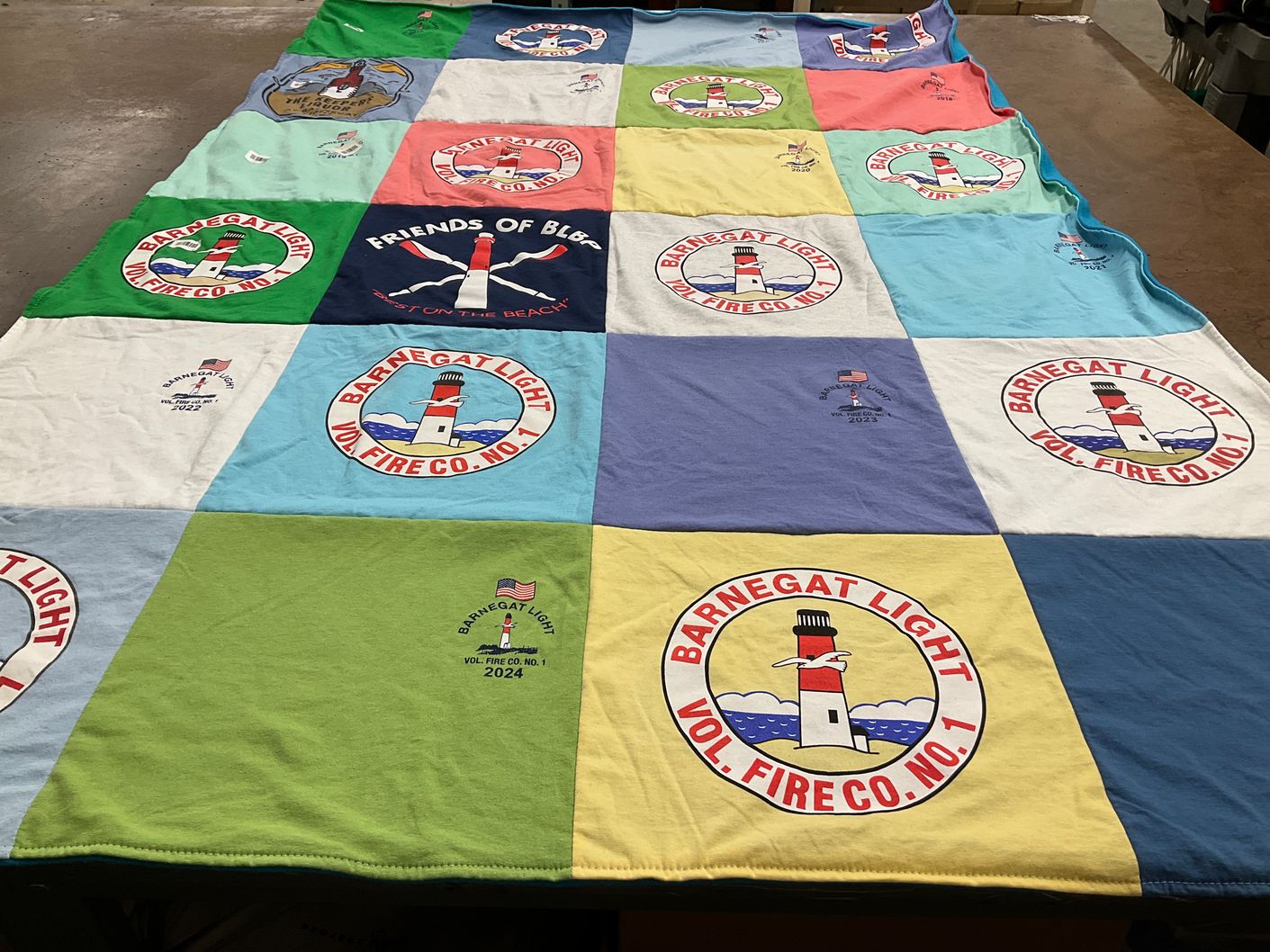 T-shirt quilt with fire safety, community service themes by Tanya from NC