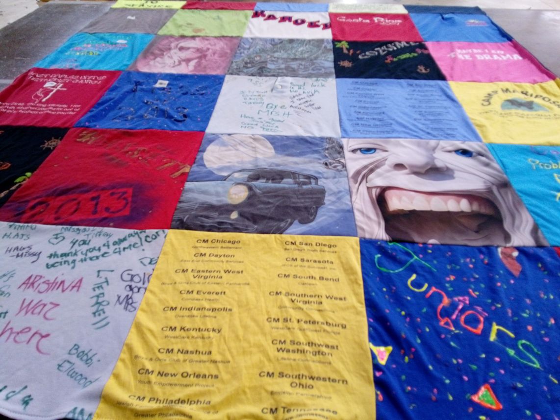 T-shirt quilt with community service, education themes by DAVID from FL