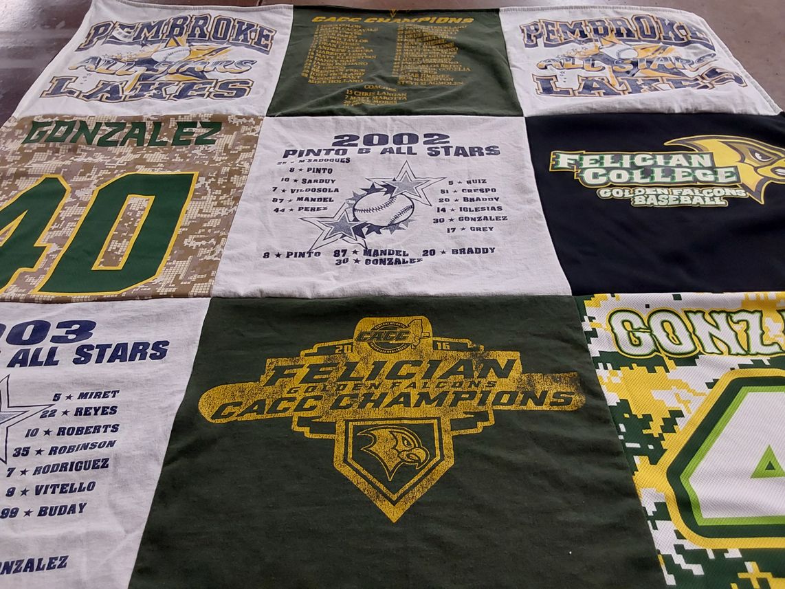 T-shirt quilt featuring golden falcons by Aurora from FL