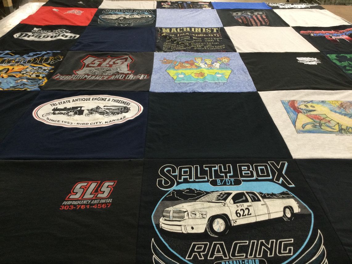 T-shirt quilt with racing, machines themes by Sarah J from CO