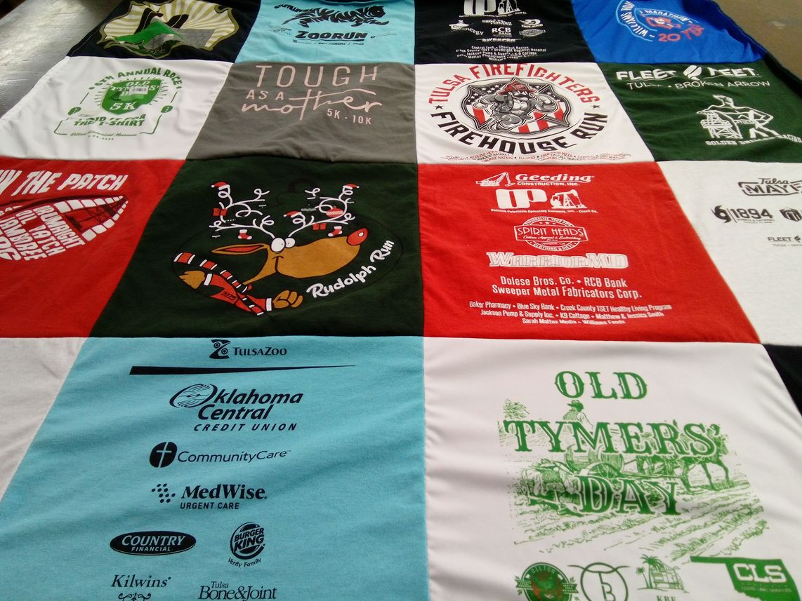 T-shirt quilt with running, community events themes by Kim from OK