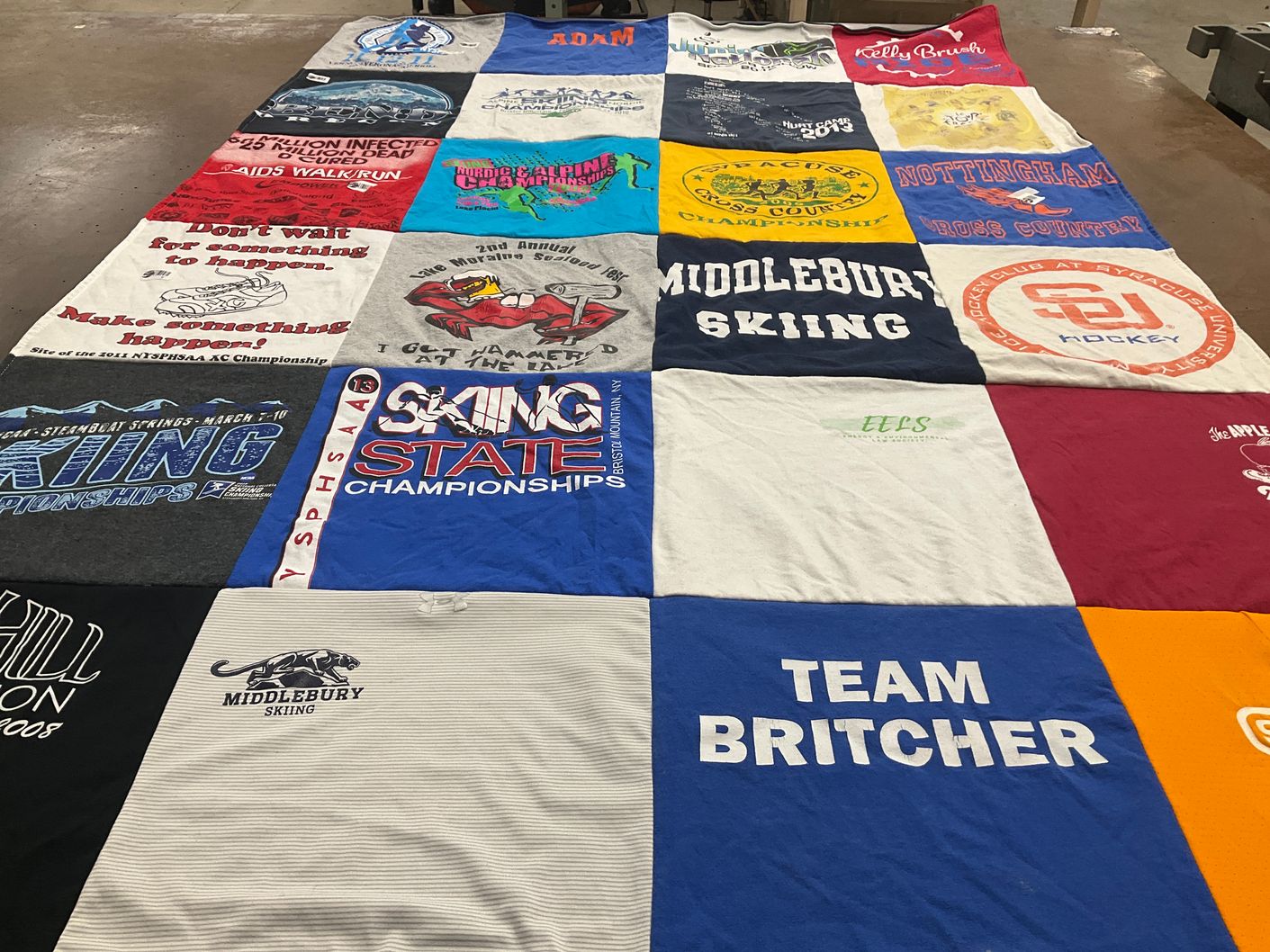 T-shirt quilt featuring middlebury college skiing, syracuse university hockey by mary from NY