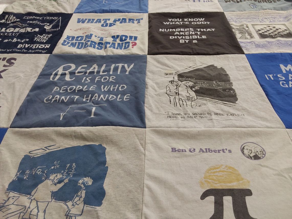 T-shirt quilt with mathematics, education themes by Mary from FL