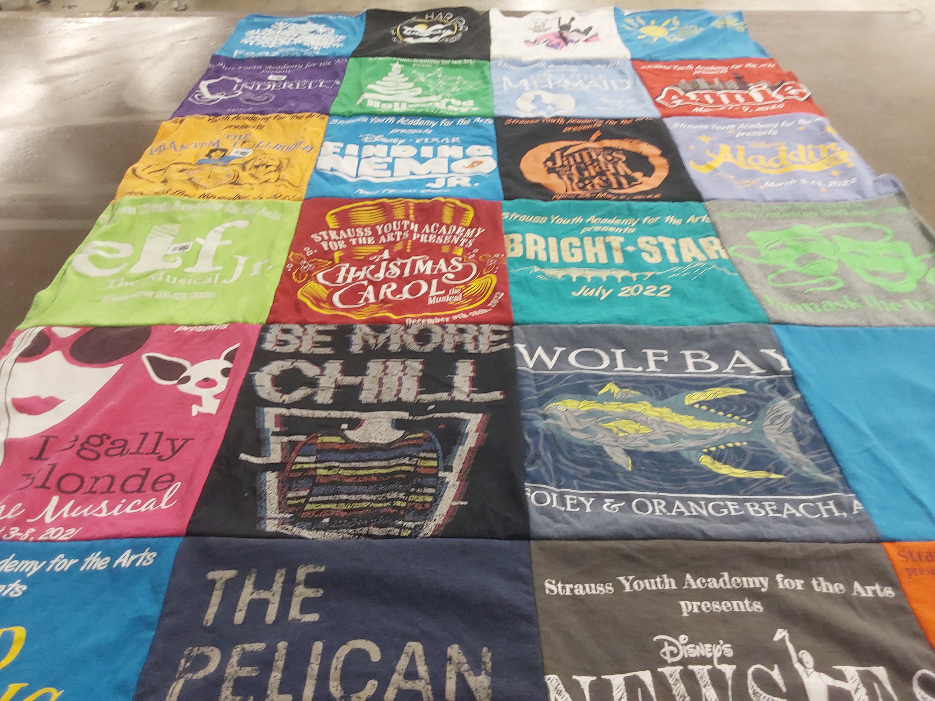 T-shirt quilt with theatre, musicals themes by Victoria from LA