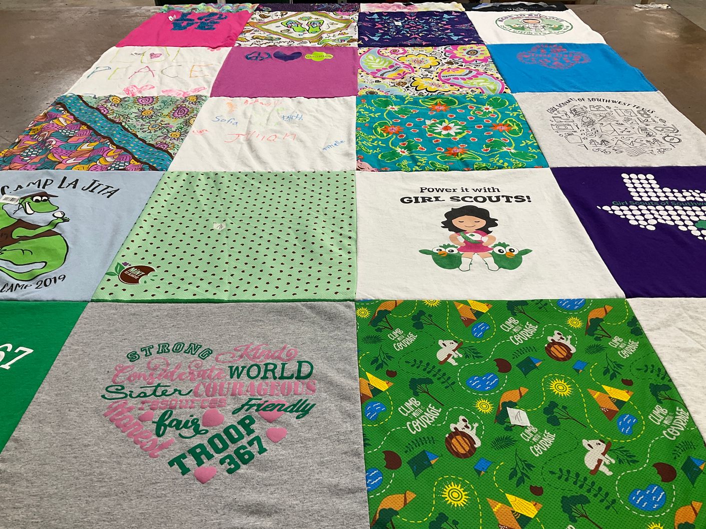 T-shirt quilt with girl scouts, camping themes by Audra from TX