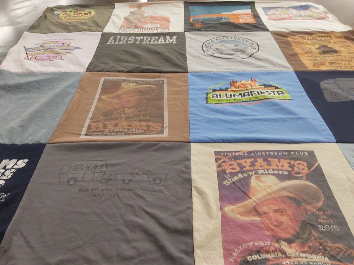 T-shirt quilt with camping, traveling themes by Shirley from CA