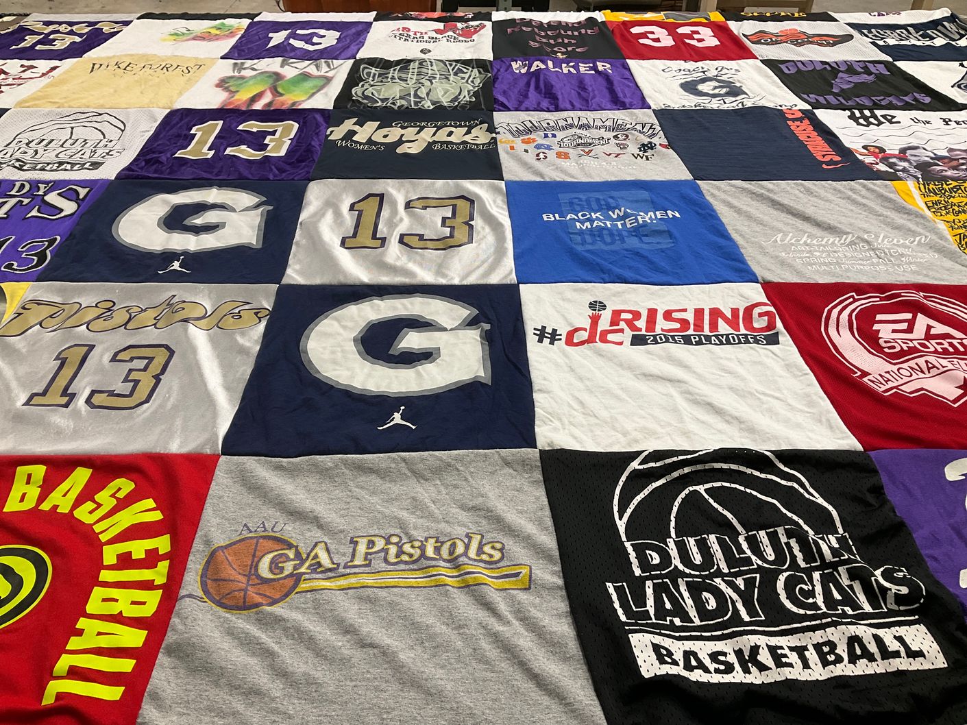 T-shirt quilt featuring georgia pistols, duluth lady cats basketball by Marvy from GA