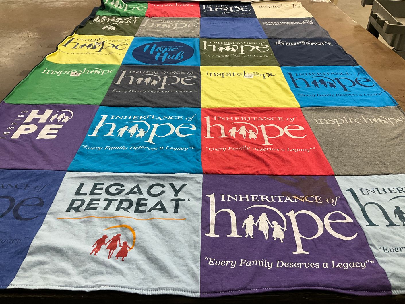 T-shirt quilt with charity, community support themes by Kelly from TX