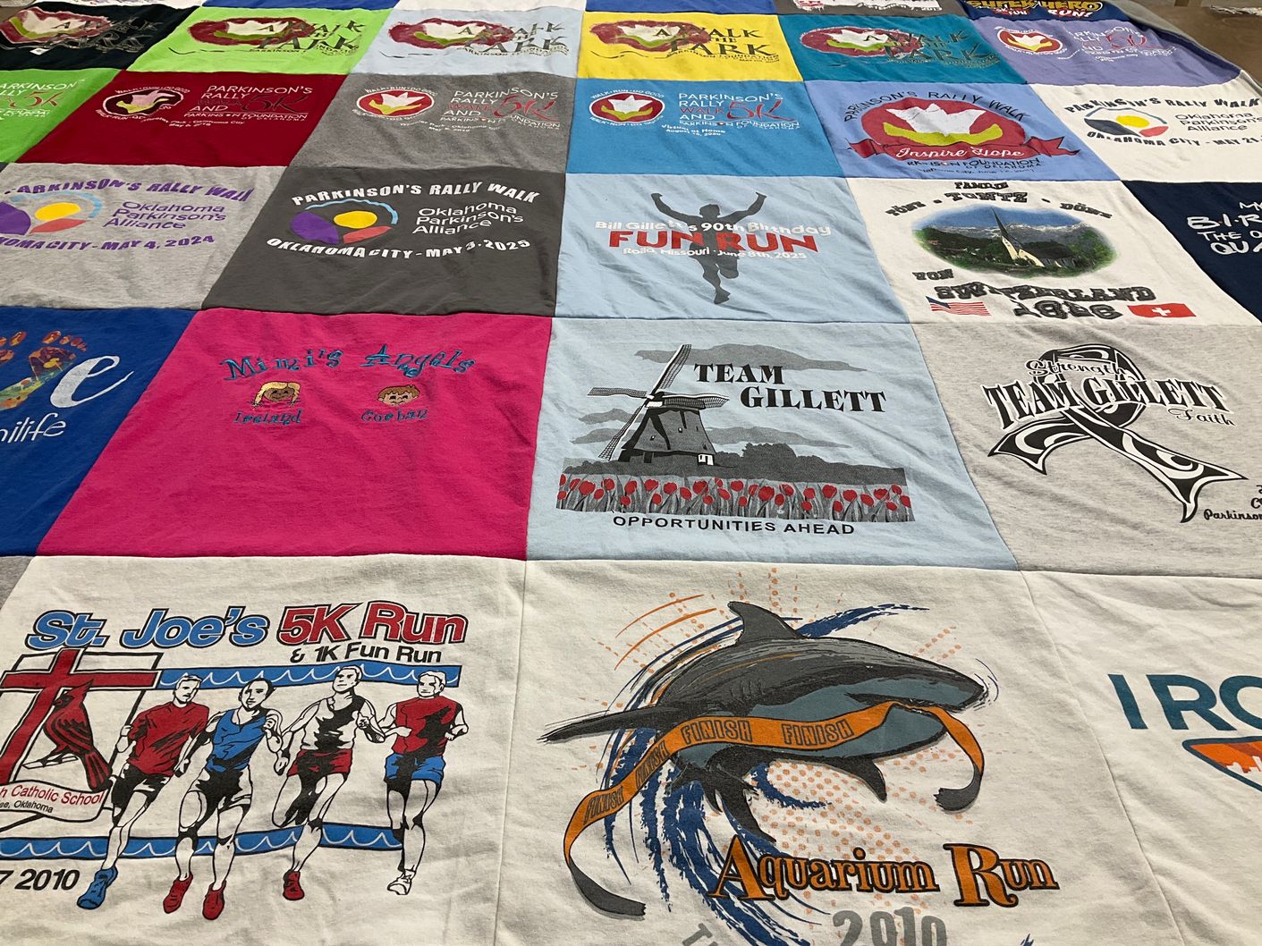 T-shirt quilt with charity, running themes by Susie from OK