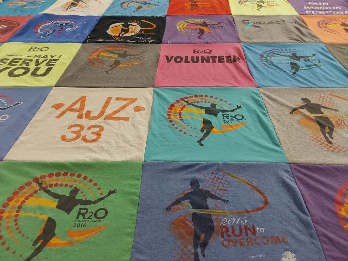 T-shirt quilt with running, volunteering themes by Samantha from NE