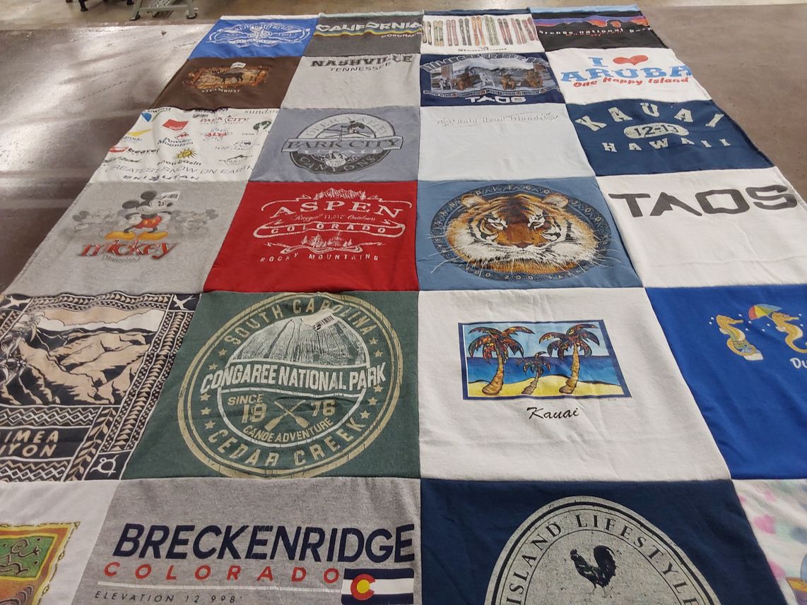 T-shirt quilt with travel, outdoors themes by Sara from DE