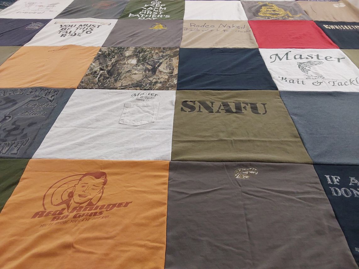 T-shirt quilt with hunting, fishing themes by Liza from SC