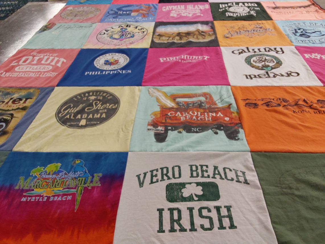 T-shirt quilt with travel, beaches themes by Dana from NC