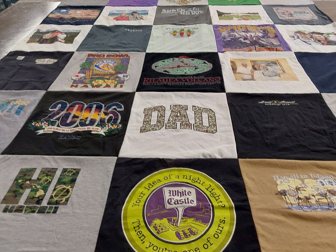 T-shirt quilt with family, travel themes by Jessica from VA