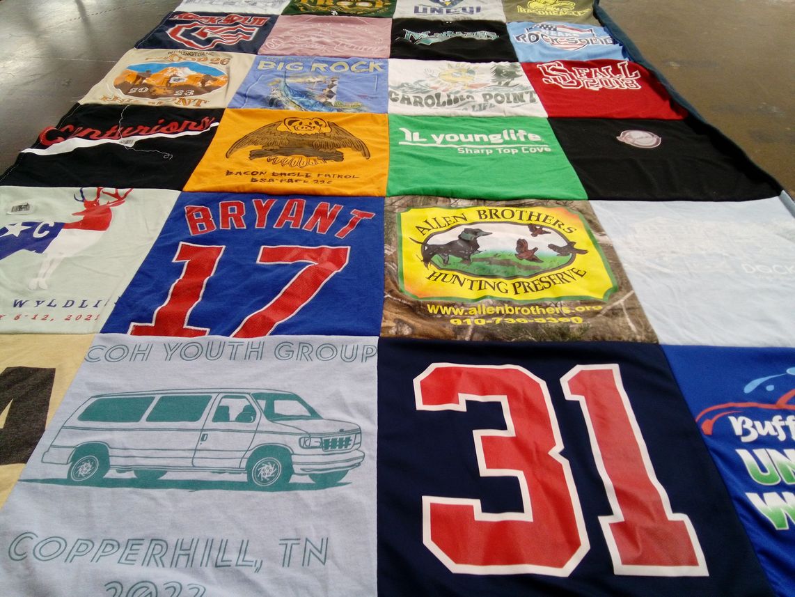 T-shirt quilt with hunting themes by Myra from NC